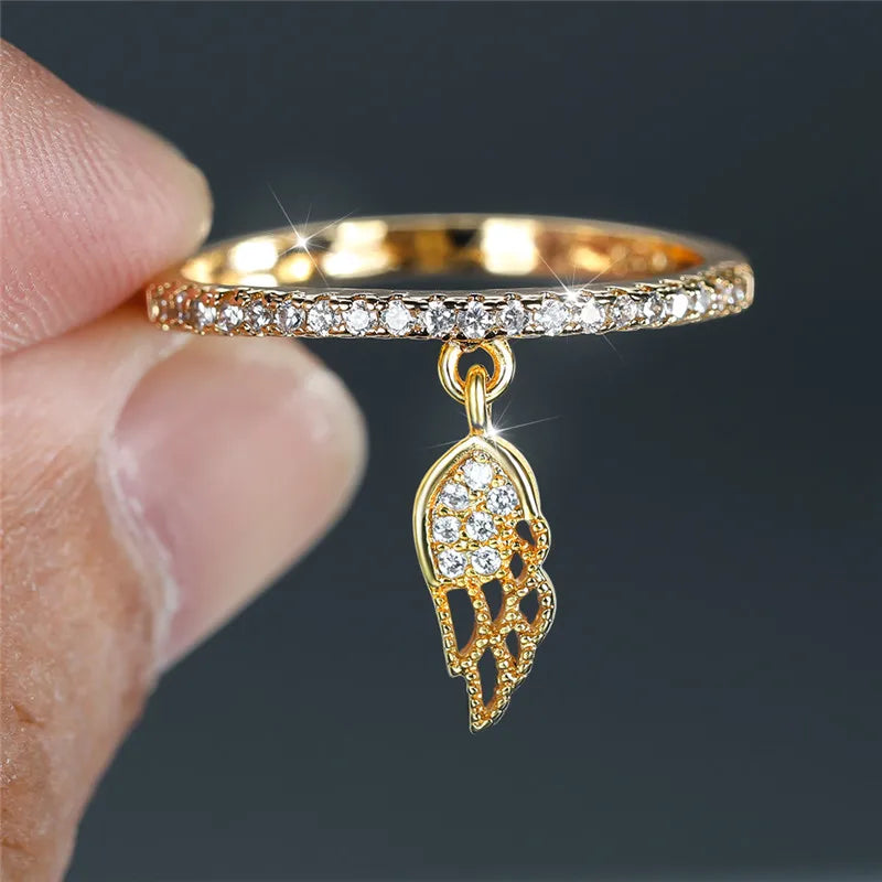 Bague avec pendentif ailes d'ange or
