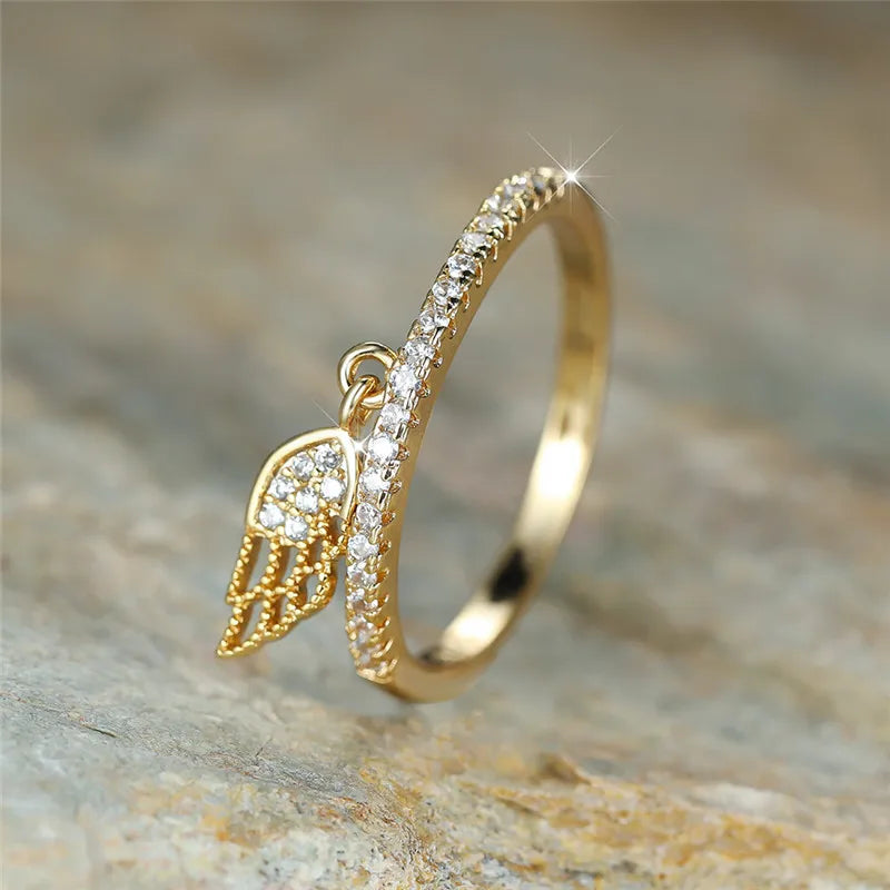 Bague avec pendentif ailes d'ange or