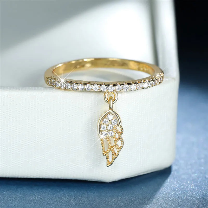 Bague avec pendentif ailes d'ange or
