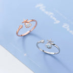 Bague Coquillages Etoile de Mer et Coquille Saint-Jacques et Zircon or rose