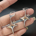 Boucles d'Oreilles Créoles Double Etoile