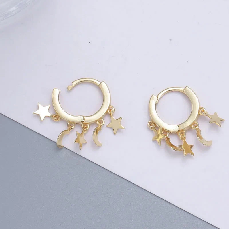 Boucles d'Oreilles Créoles Etoiles et Lunes pendantes or