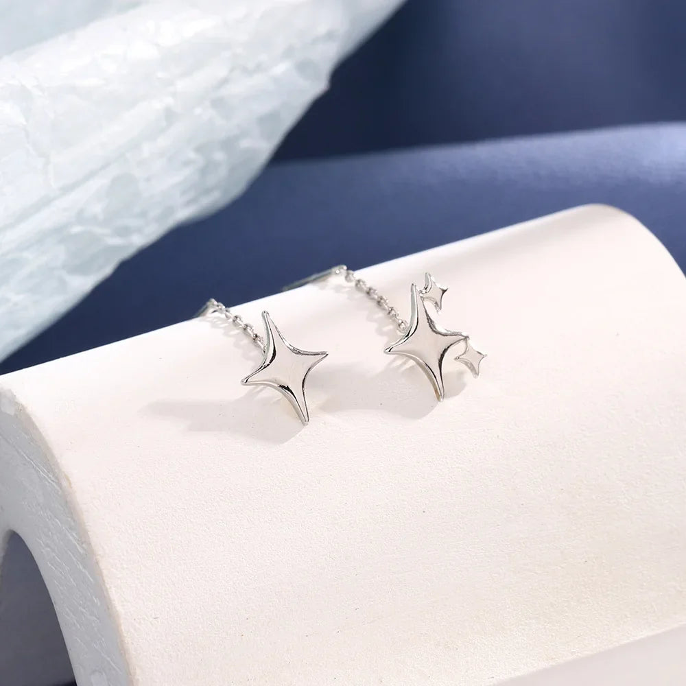 Boucles d'Oreilles Différentes Pendantes de Charme Etoiles