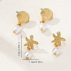 Boucles d'oreilles dorées coquillage et perle
