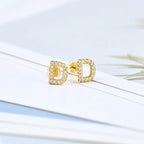 Boucles d'oreilles initiale