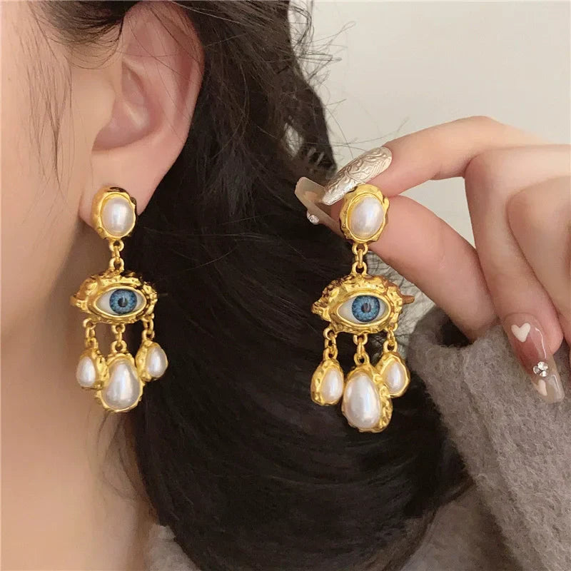 Boucles d'Oreilles Pendantes Oeil Bleu et Perles or