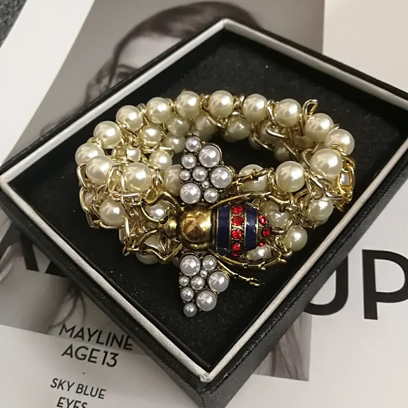 Bracelet avec perles abeille bleu