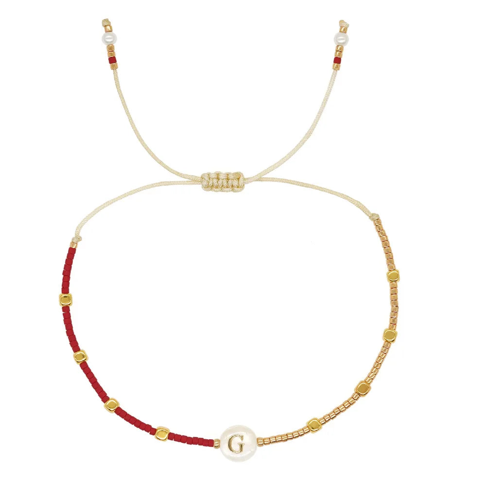 Bracelet bicolore initiale g