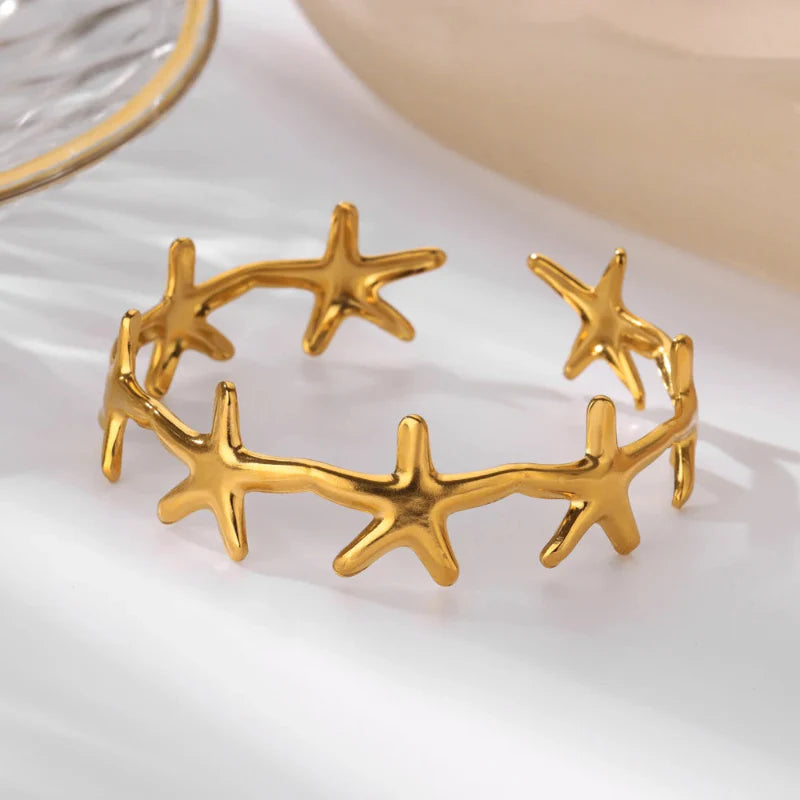 Bracelet Elégant Coquillages Etoile de Mer et Coquilles Saint-Jacques étoile de mer or