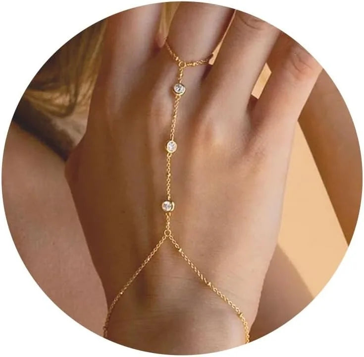 Chaîne pour main et doigt avec zircons - bracelet de main pour femme or