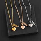 Collier d'urne avec pendentif ailes d'ange et coeur argent