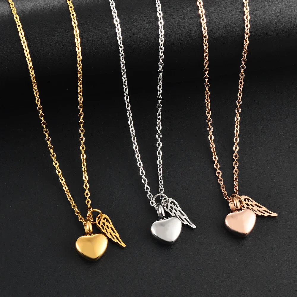 Collier d'urne avec pendentif ailes d'ange et coeur or