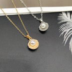 Collier avec Pendentif Coquille Saint-Jacques et Perle or