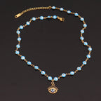 Collier en Perles avec Pendentif Oeil Bleu Style 1