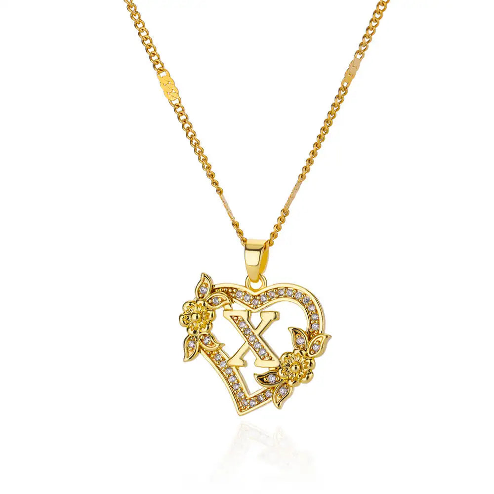 Collier avec pendentif initiale et coeur x