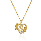 Collier avec pendentif initiale et coeur s