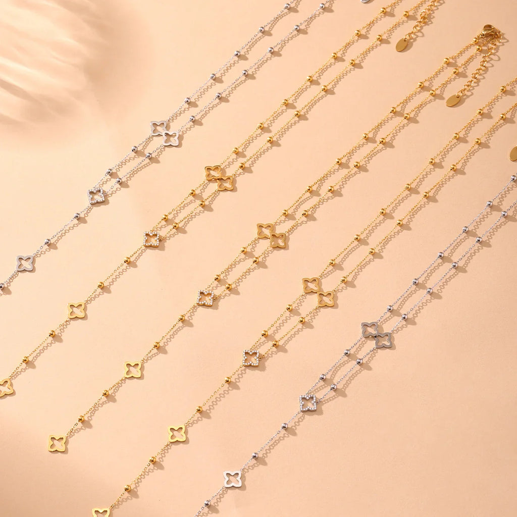 Collier Long avec Pendentifs Trèfle à 4 Feuilles et Zircon or